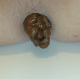 This is a close & nasty view of a woman taking a firm, semi-hard, club-shaped shit. Presented in 720P HD. Over a minute.